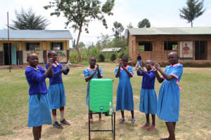  Girls Washing Hands At Handwashing Station