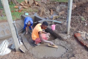 The Water Project: Machemo Community, Davis Mamuti Spring -  Plastering Stairs