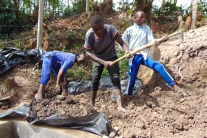 The Water Project: Shivagala Commmunity, Wekoye Spring -  Backfilling Soil