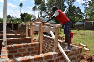 The Water Project: Friends School Demesi Secondary -  Artisan Fitting Door Frames