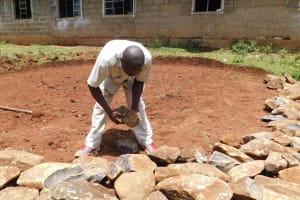 The Water Project:  Laying Stones