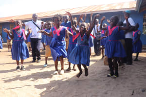 The Water Project: Tintafor, St. Augustine Primary School Gate -  Students And Teachers Celebrating Clean