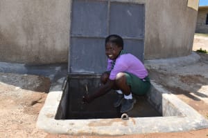 The Water Project: Muhaya Secondary School -  Sharon Collecting Water