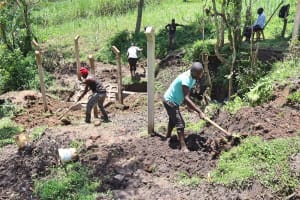 The Water Project: Mukavakava Community 2 -  Backfilling Soil Cover
