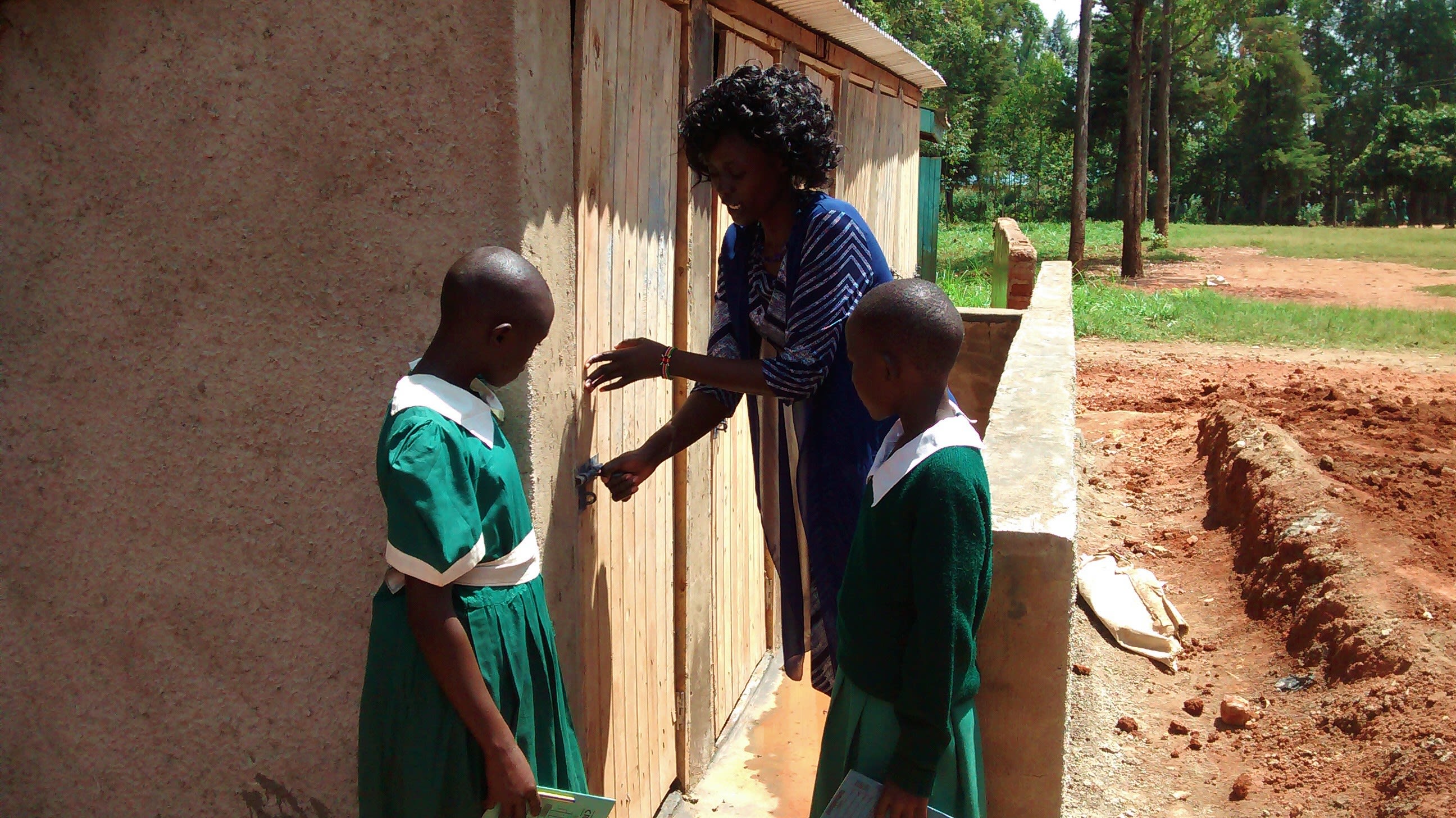 6 kenya4668 girls learning about latrine use