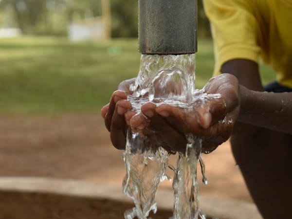 Clean water flowing daily from crypto-funded well in Kenya with GPS monitoring