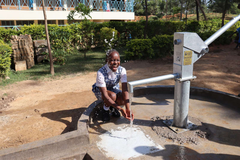 Collecting water at the pump