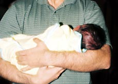 A father with his baby, The CSA, Guilty until proven innocent.