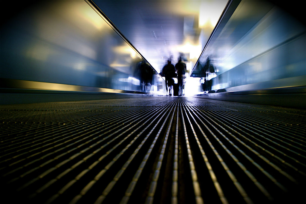 An airport travelator, moving walkway