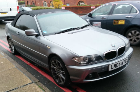 A BMW parked in a stupid place at Heartlands Hospital, Birmingham