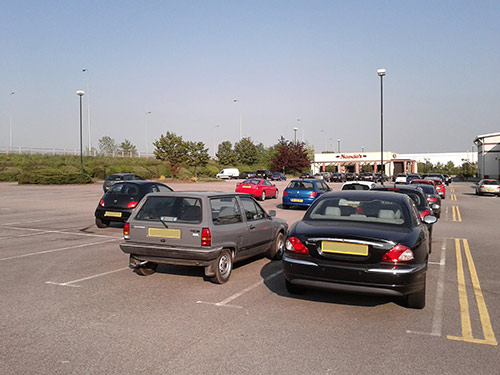 Parking spaces should be bigger, NOT smaller