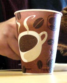 A disposable coffee cup