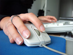 Hands on a computer keyboard