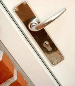 Door handle - the busybody neighbour poking her nose in?