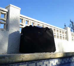 Luggage by the swimming pool