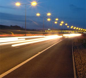 Traffic at night on the M25, middle lane drivers