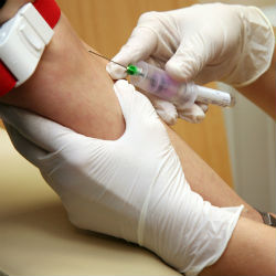 A nurse giving someone an injection