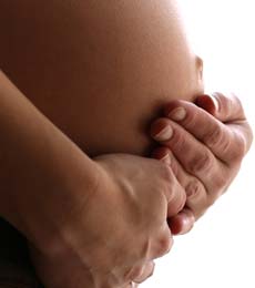 A pregnant woman - life with kids or a career