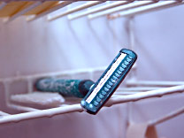 Shaving woes, a razor on a shower tray