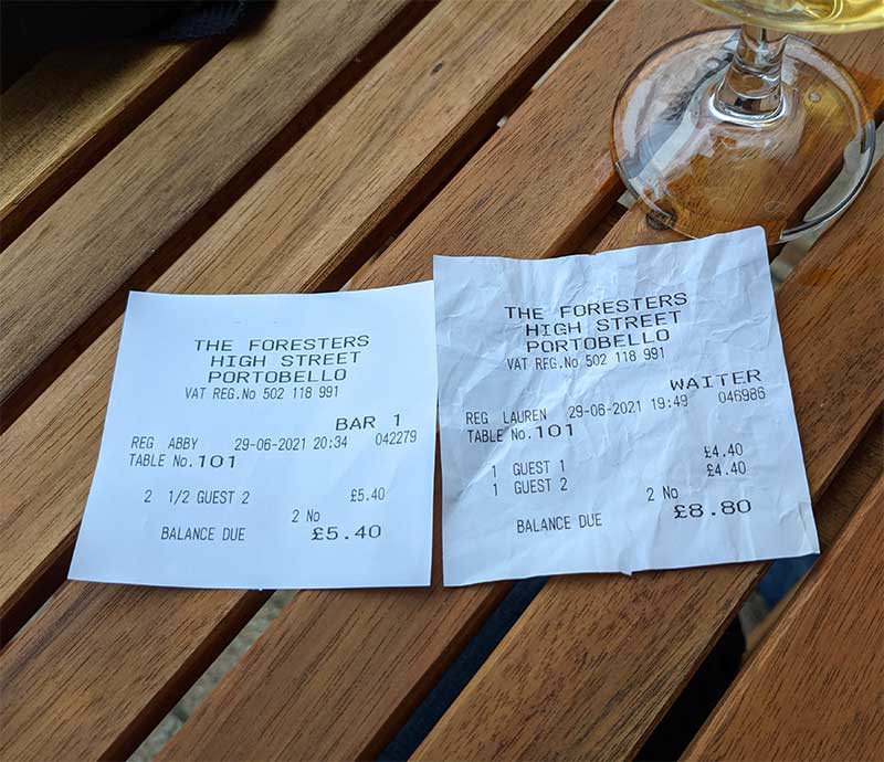 Receipt for beer order - two halves more expensive than a pint.