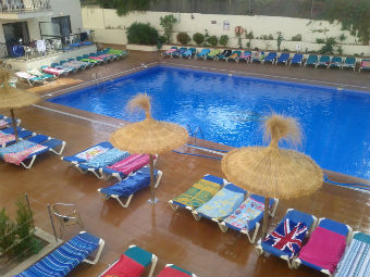 Sun loungers reserved with beach towels