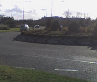 A car leaving a roundabout - near the A421, Milton Keynes