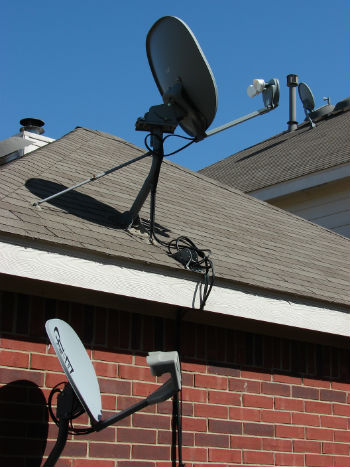 Sky dish on a roof