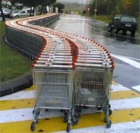 Trolley's snaking into the distance at a supermarket