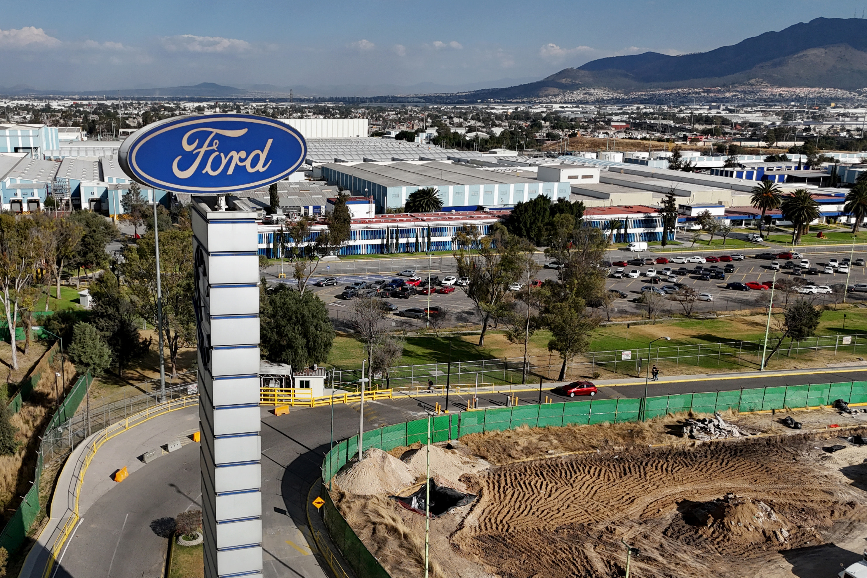 Aerial view of the U.S. Ford factory cars in Cuautitlan Izcalli, Mexico state, Mexico, taken on January 30, 2025. Mexican President Claudia Sheinbaum said Wednesday she was confident that her country could avoid being hit with 25-percent tariffs by her US counterpart Donald Trump on February 1. (Photo by ALFREDO ESTRELLA / AFP) (Photo by ALFREDO ESTRELLA/AFP via Getty Images)