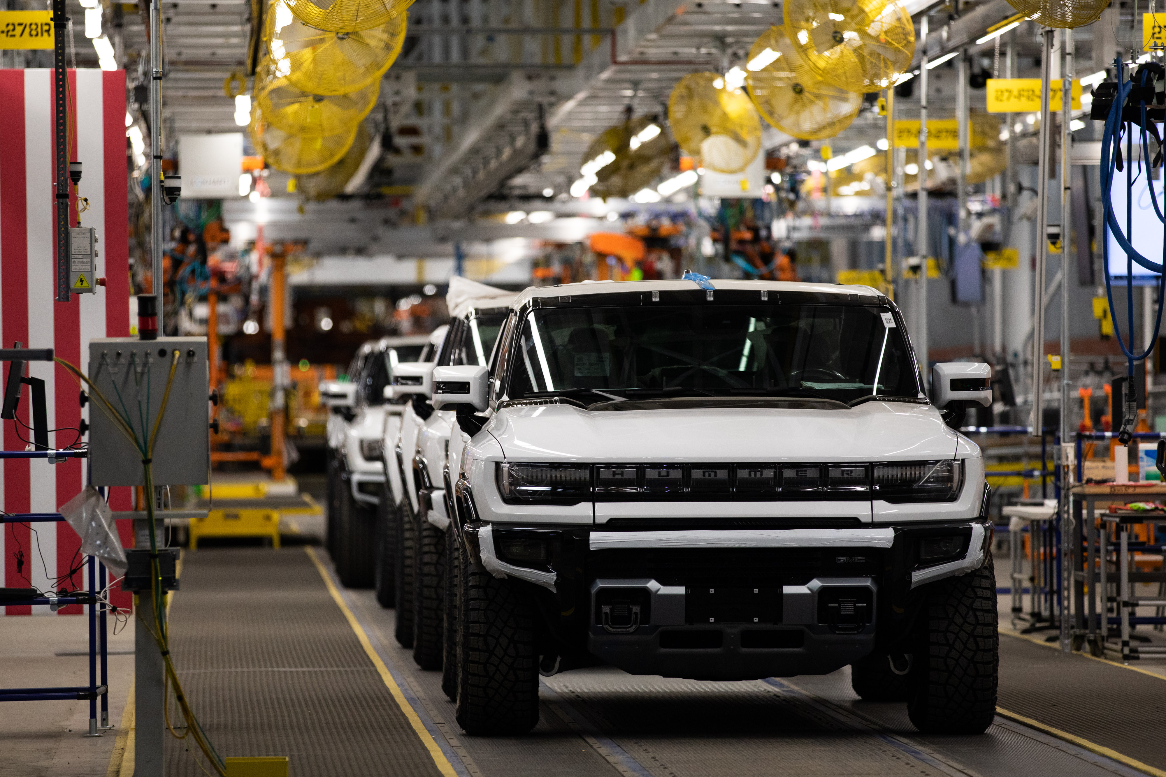 GMC Hummer electric vehicles on the production line at General Motors' Factory ZERO all-electric vehicle assembly plant in Detroit, Michigan, U.S., on Wednesday, Nov. 17, 2021.