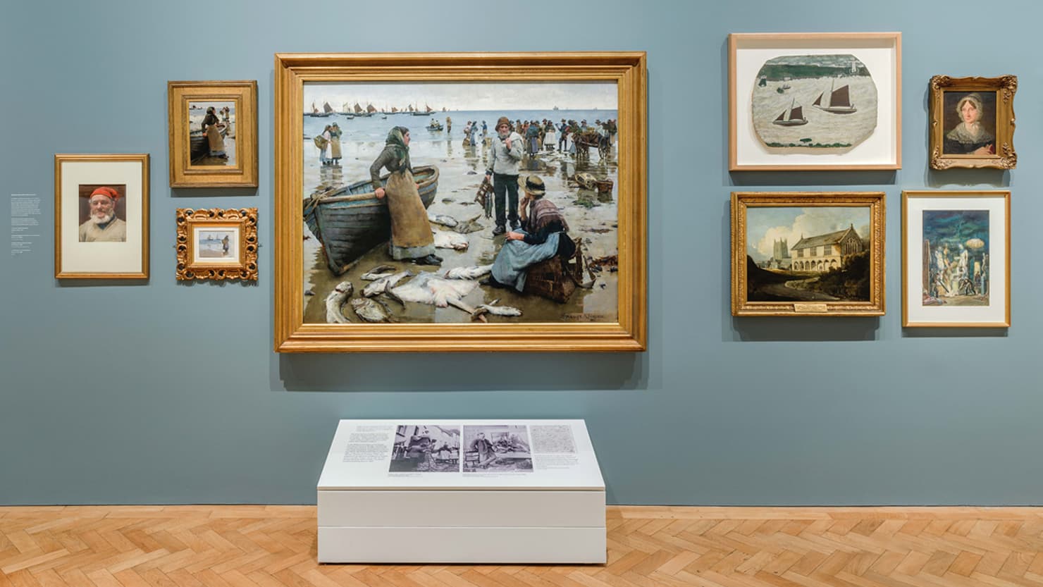 'A Fish Sale on a Cornish Beach' by Stanhope Forbes plus other works in the 'Our Art' gallery at The Box, Plymouth