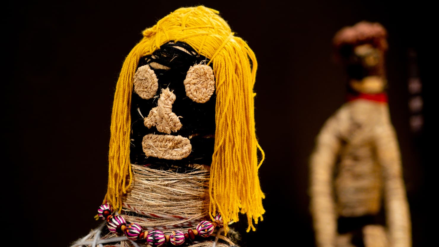Close up of a woven figure of a female