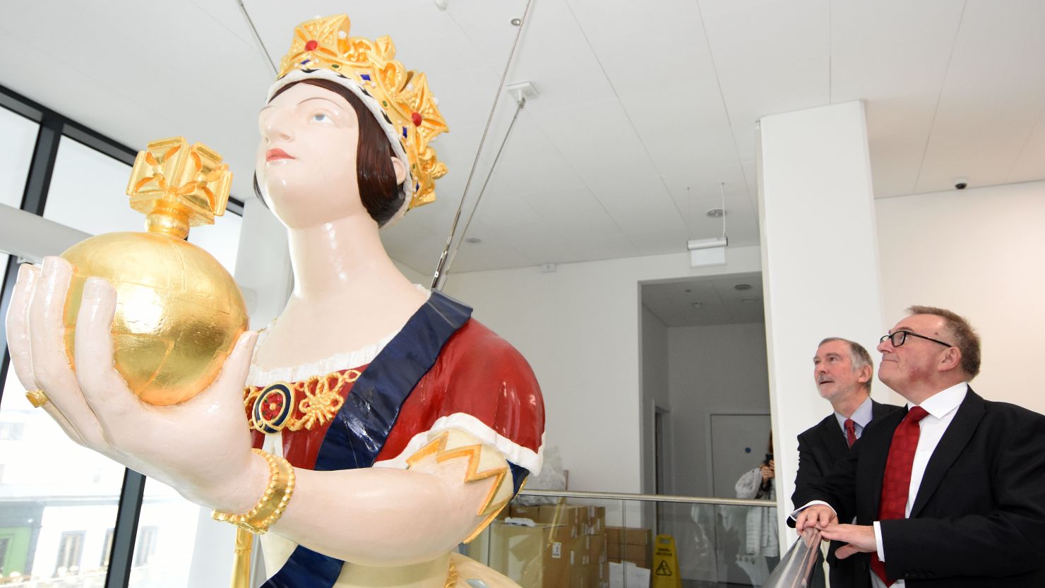 Councillors Tudor Evans and Ian Bowyer with the Windsor Castle figurehead