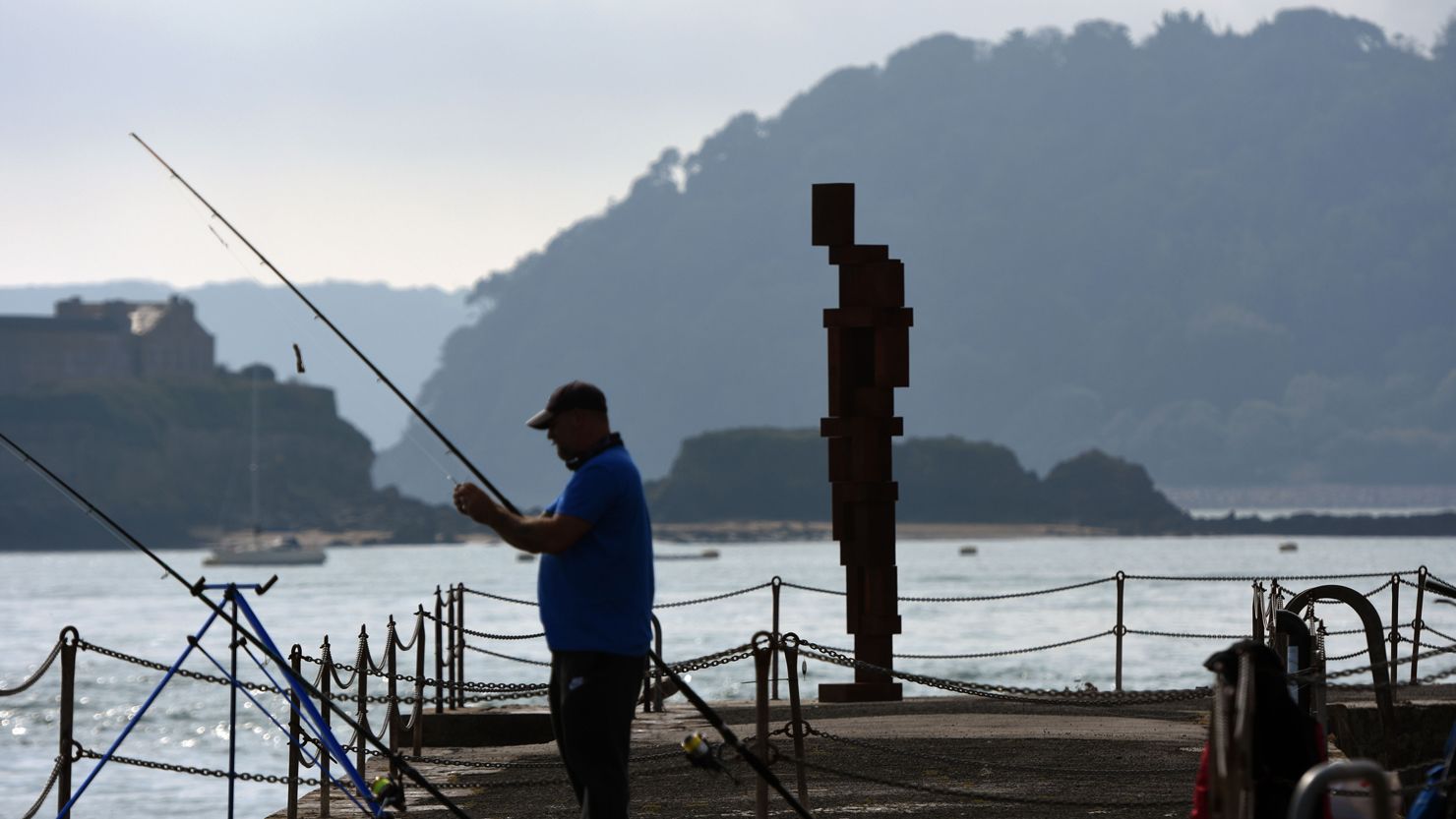 Look II - West Hoe Pier sculpture + fisherman, September 2020