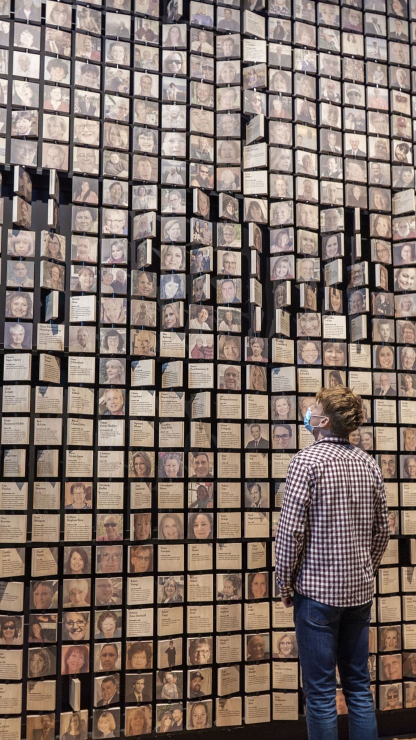 A visitor looking at the Mayflower 400: Legend and Legacy exhibition at The Box