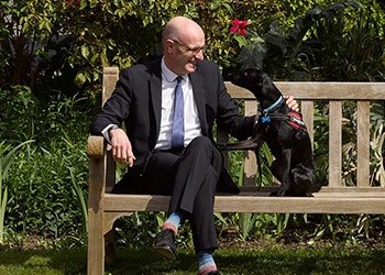 Peter and Bertie sitting on a bench