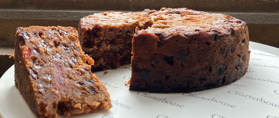 Fruit cake with slice cut out