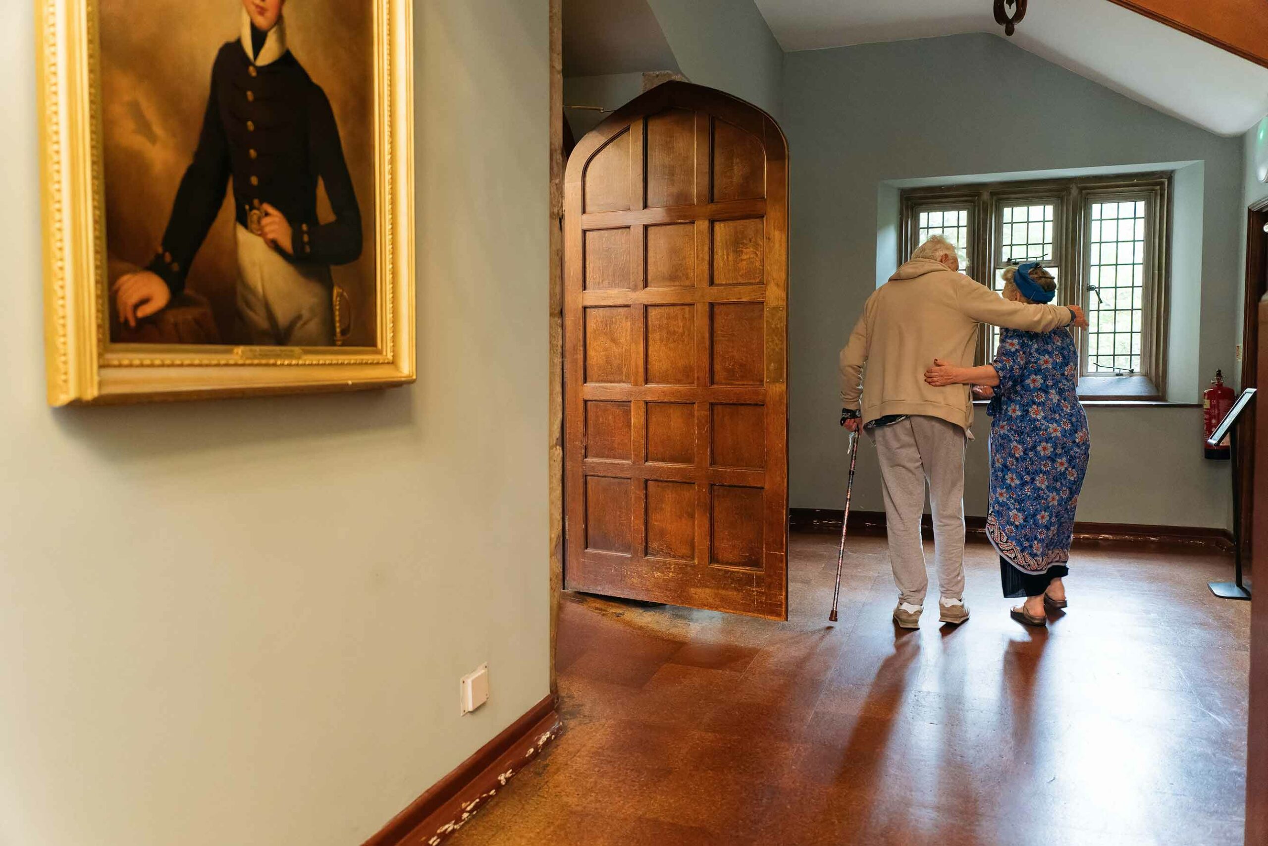 Brothers at The Charterhouse walk together in the corridor