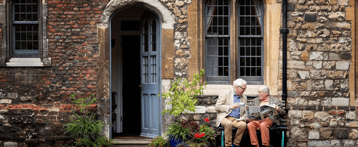 Two Brothers at The Charterhouse sit in the sun