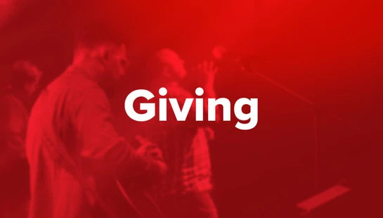 The word 'Giving' in white text over a red-tinted, blurry photo of a worship band performing on stage during a church service.