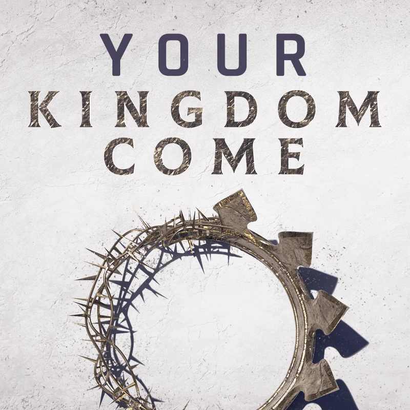 The text 'Your Kingdom Come' sits above a golden crown combined with a crown of thorns, casting a shadow on a light, textured surface.