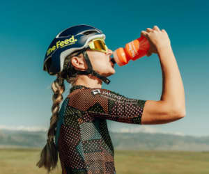 Runner on a trail wearing a hydration vest