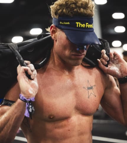 Cyclist on a road with The Feed helmet