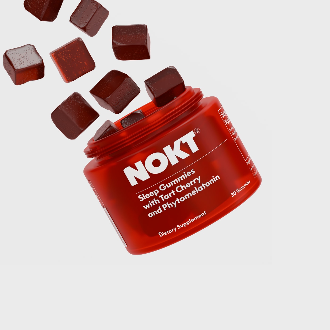 Tub of bright red Nokt Sleep Gummies spilling out
