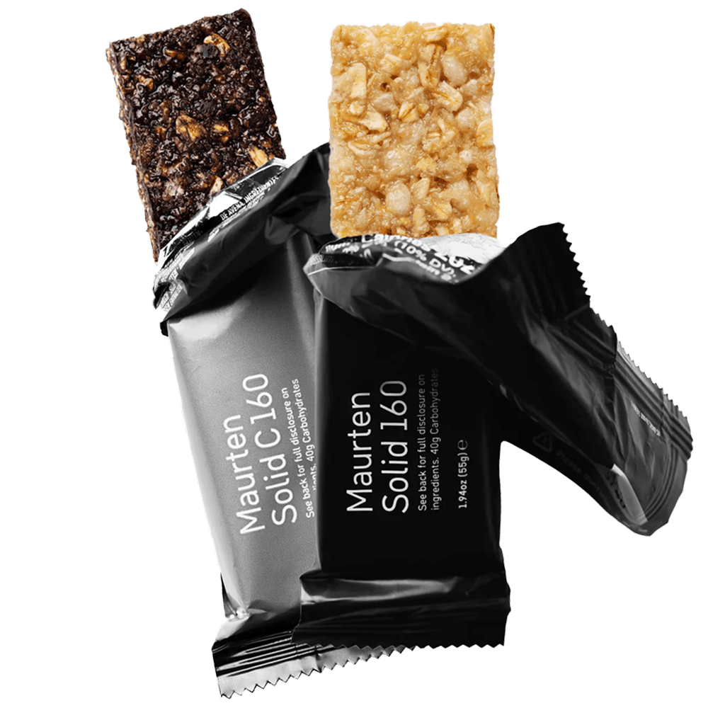 Maurten Solid C160 energy bars in cocoa and oat flavors — low-fiber, high-carb fuel for endurance performance