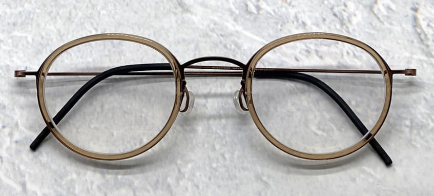 MYKITA and Lindberg titanium frames side by side — a comparison of two luxury eyewear philosophies