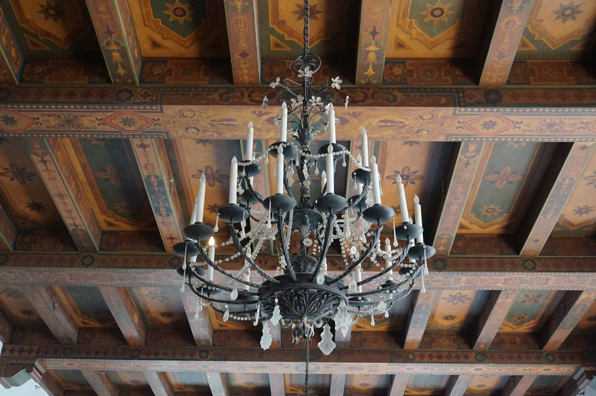 A chandelier on the ceiling