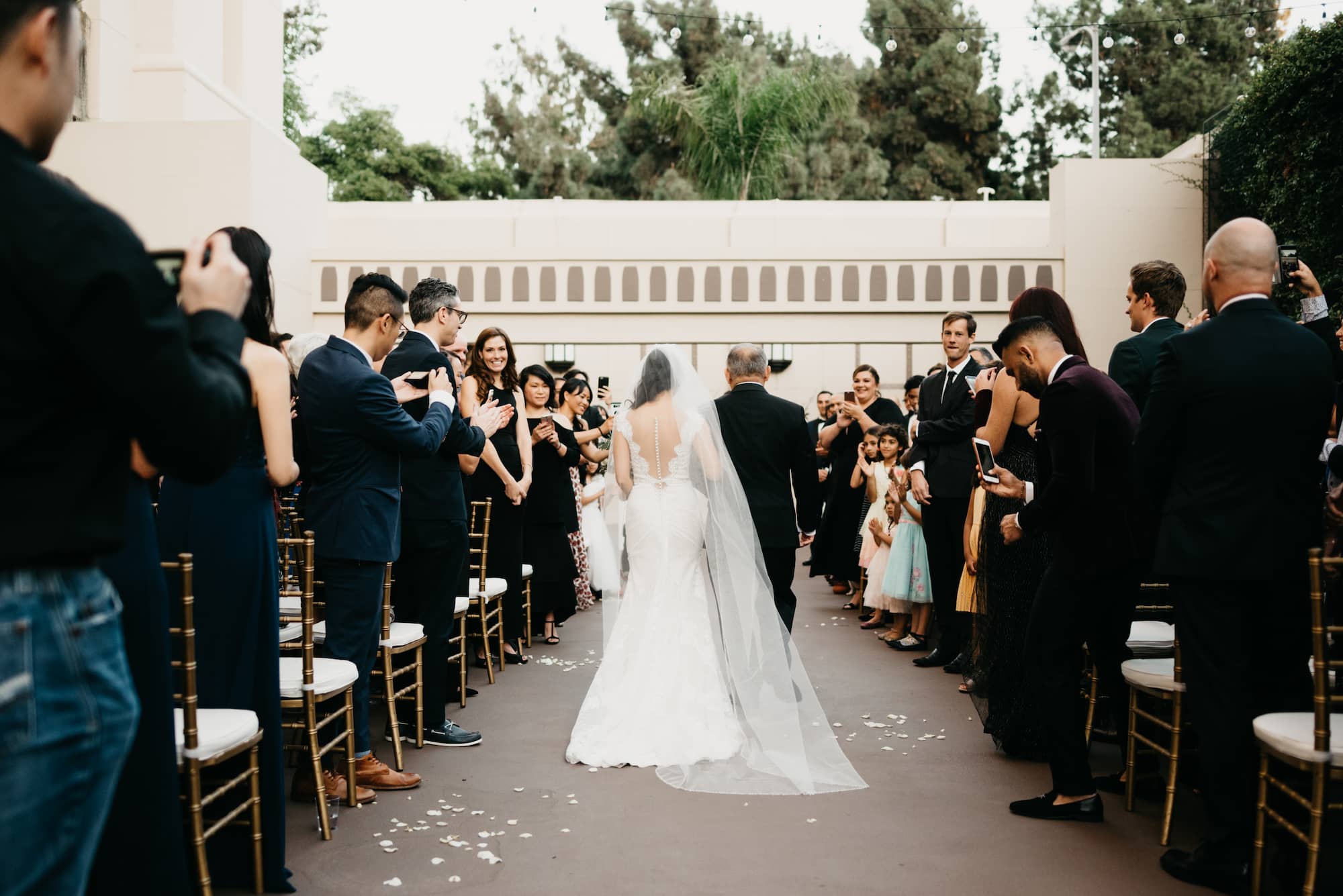 Bride and groom walking down aisle