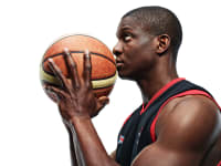 Portrait of man with basketball