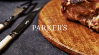 Parker's logo identity over picture of pork roast